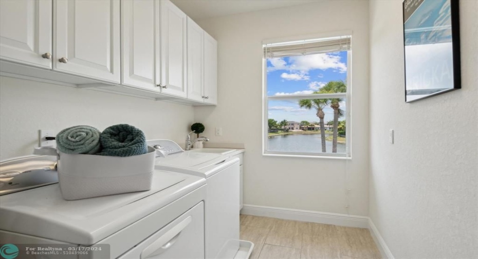 Upstairs Laundry Room with Sink and Storage