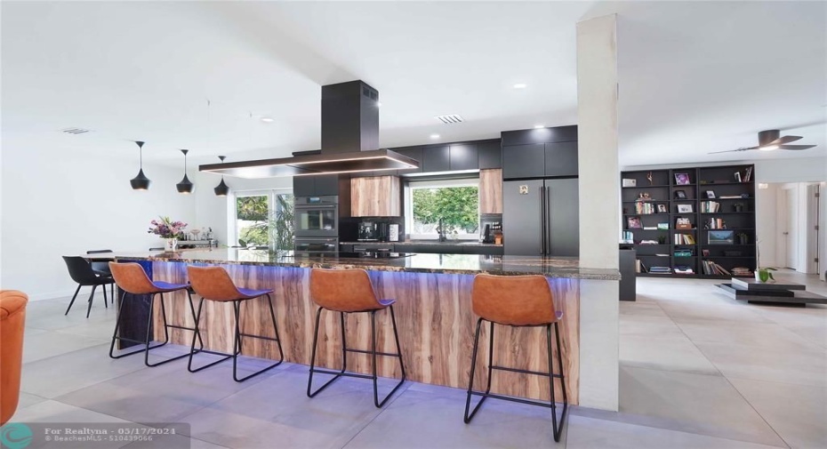 To the right of the kitchen is a bonus room.