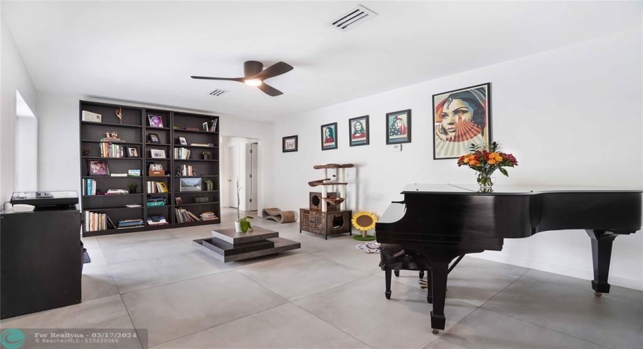 What a lovely sun filled bonus room.