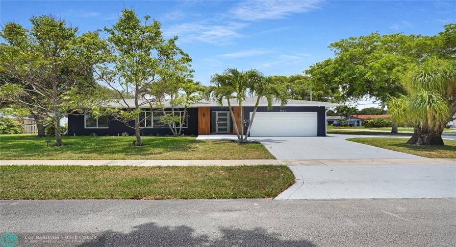 This is a totally updated 4 bedroom/2 bath 2 garage pool house on a corner lot.
