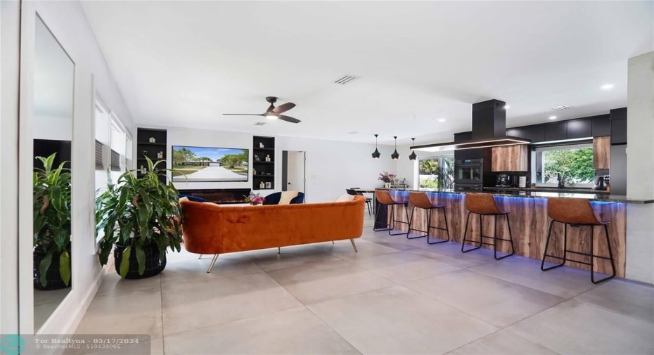 There is plenty of seating at the granite kitchen island.