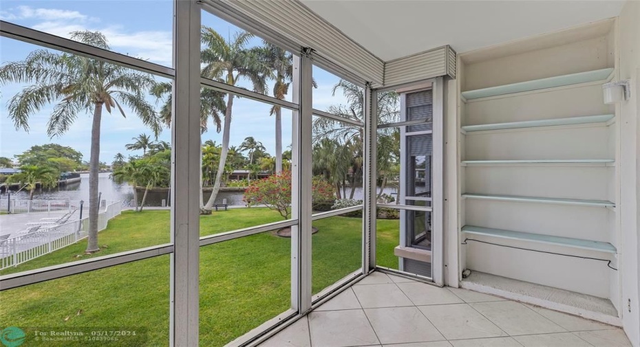 Roll down storm shutters for the screened balcony.