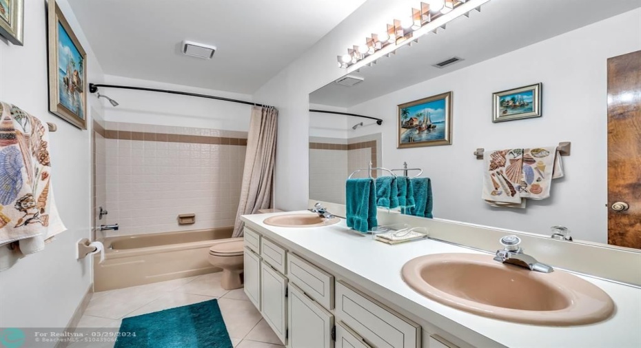 DOUBLE SINKS IN HALL BATHROOM