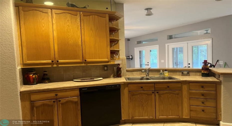 Kitchen with 42 inch wood cabinets and granite countertops