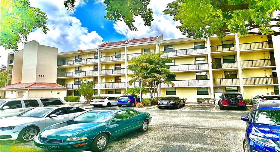 Building (117) enhanced with new exterior paint and the first building to complete its 40-year recertification.