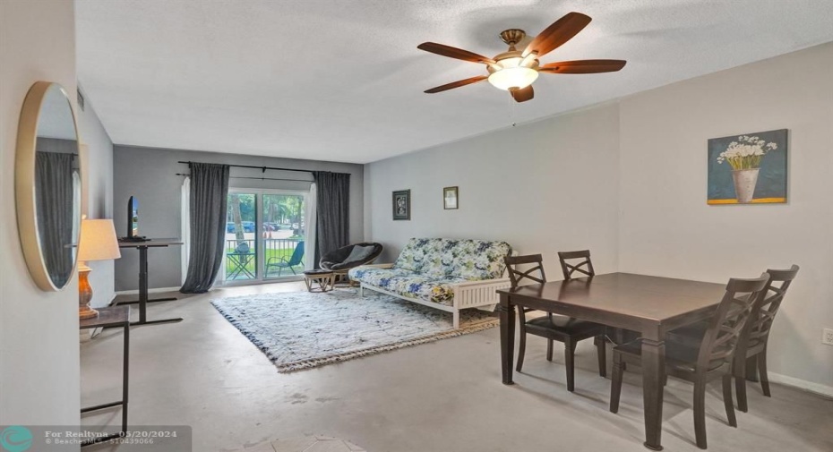 Welcome home to your ground floor, sunlit condo!