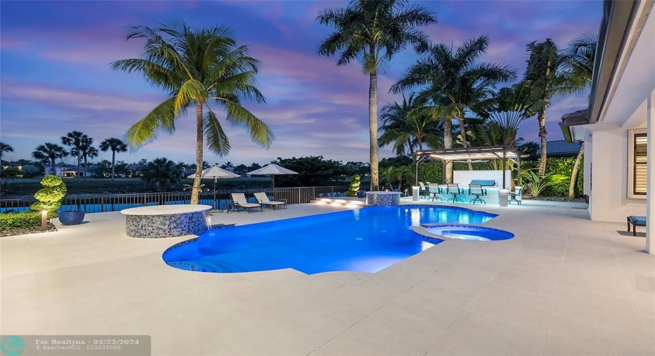 Sapphire blue pool is a favorite and you can change the color of the pool with your LED Remote control which controls the underlighting on the Pergola seating area and the landscape lighting and outside LED lighting which can all be controlled by your smartphone, so you can light the house up even if you are out of town.