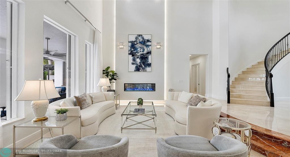Living room from the side view this entryway and living room has 2 story height of 24 feet,