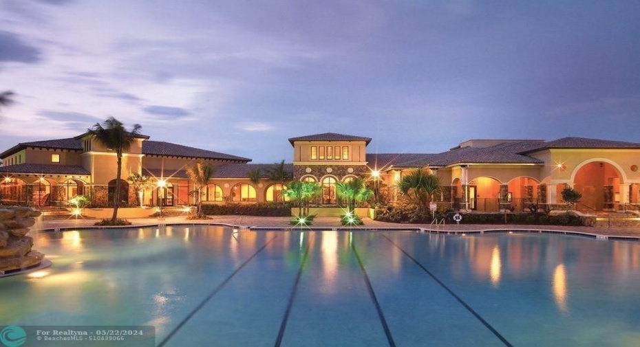 Heron Bay Pool at night time, There are 3 lap lanes in our heated resort size pool + 1 spaWe have steam rooms and saunas in the locker rooms also