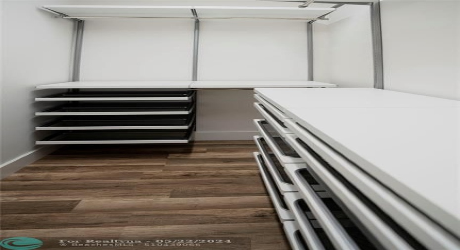 Fancy Walk In closet with plenty of storage