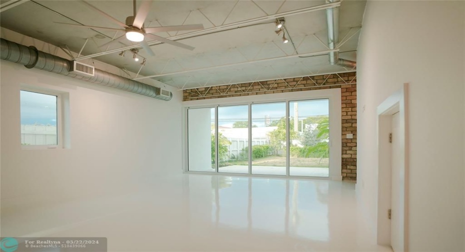 With Tall Open Ceiling