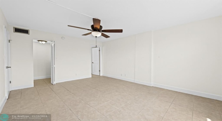 Primary Bedroom w Walk-In Closet & Bathroom entrance