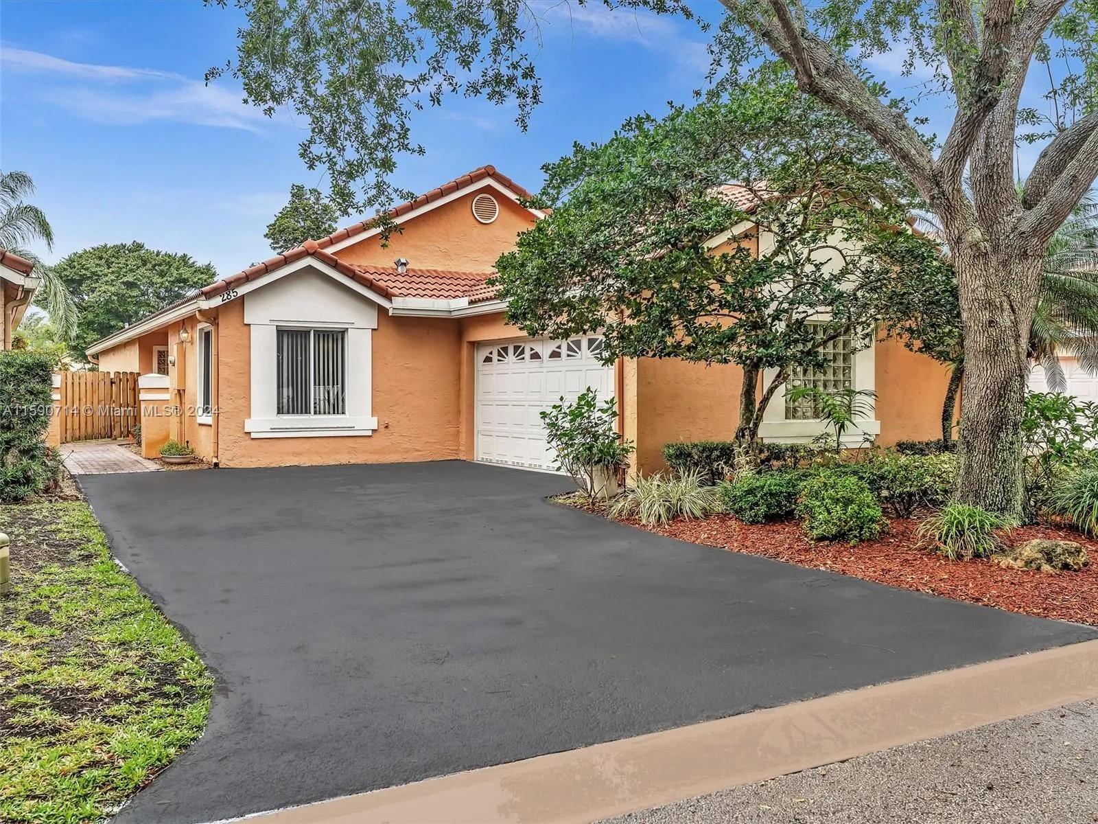 Front of home w/long driveway