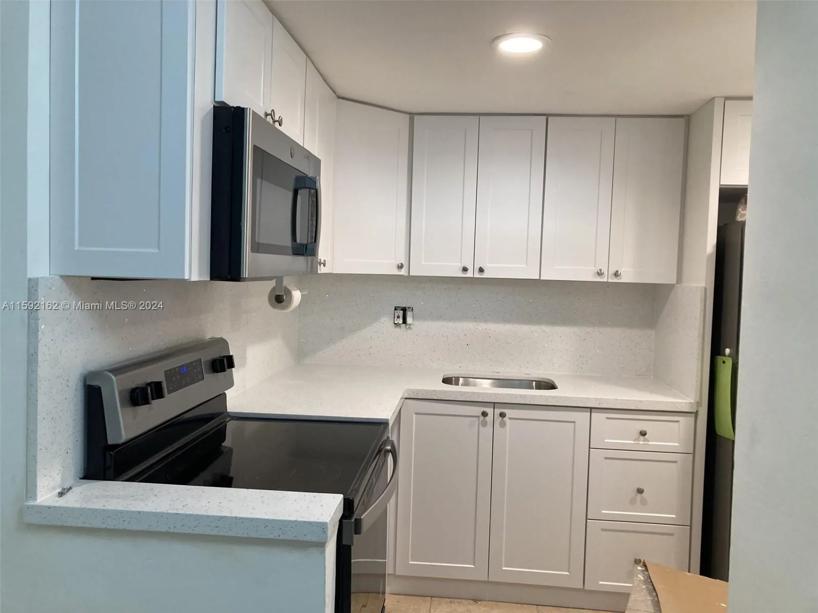 New kitchen coming up.This is a sample of the cabinets/quartz