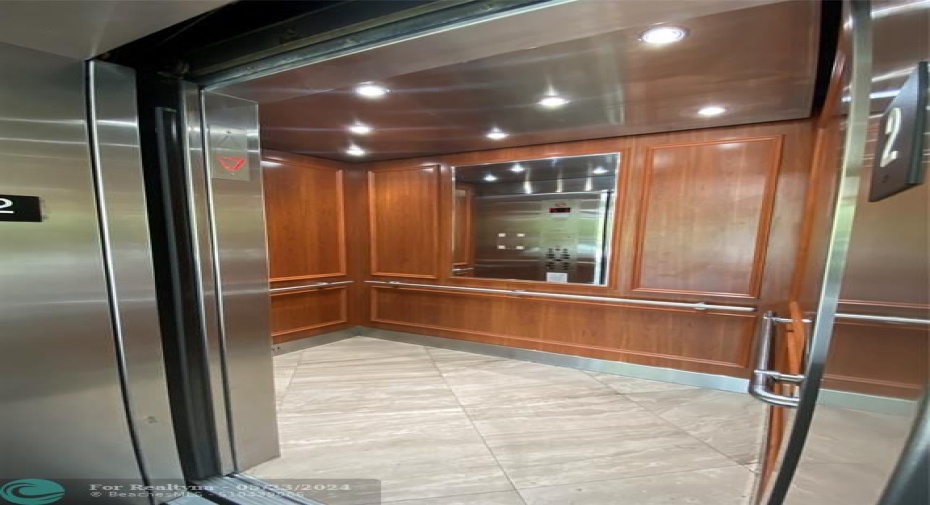 Mirrored Ample Elevator