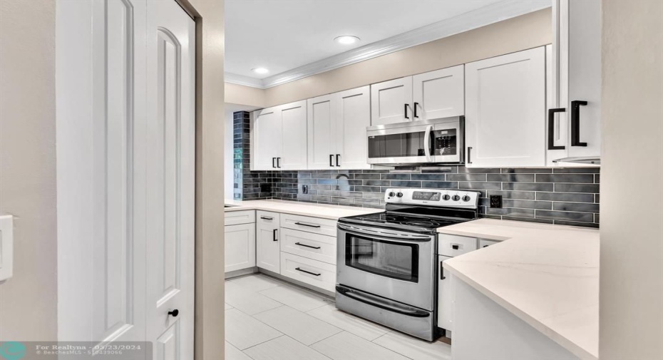 kitchen entrance with Pantry on the left