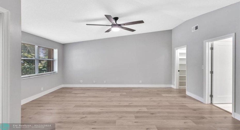Primary Bedroom with Walk-in Closet and En-Suite Bathroom