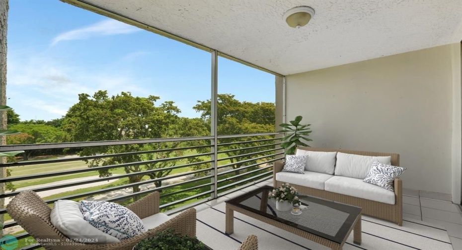 Enjoy morning coffee and endless sunrises on your screened balcony.