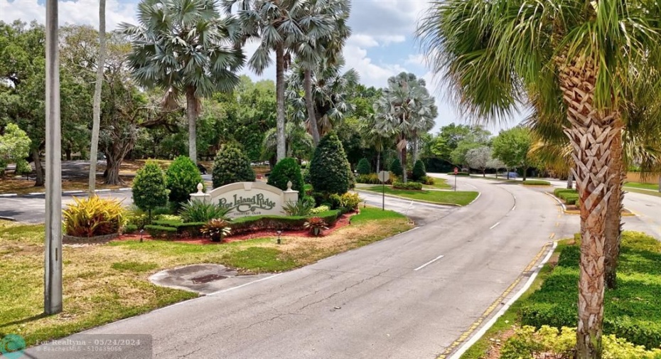 Pine Island Ridge Country Club is steps away.