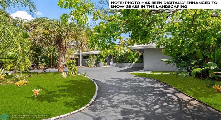 NOTE: PHOTO HAS BEEN DIGITALLY ENHANCED TO SHOW GRASS IN THE LANDSCAPING