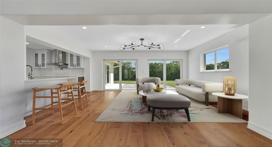 Virtually staged AS FAMILY ROOM.