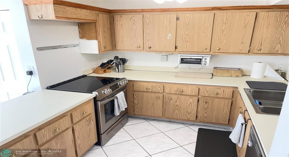 Microwave added above stove