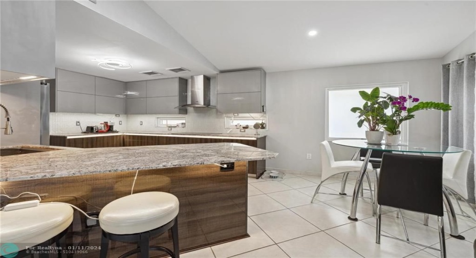 KITCHEN AND BREAKFAST AREA